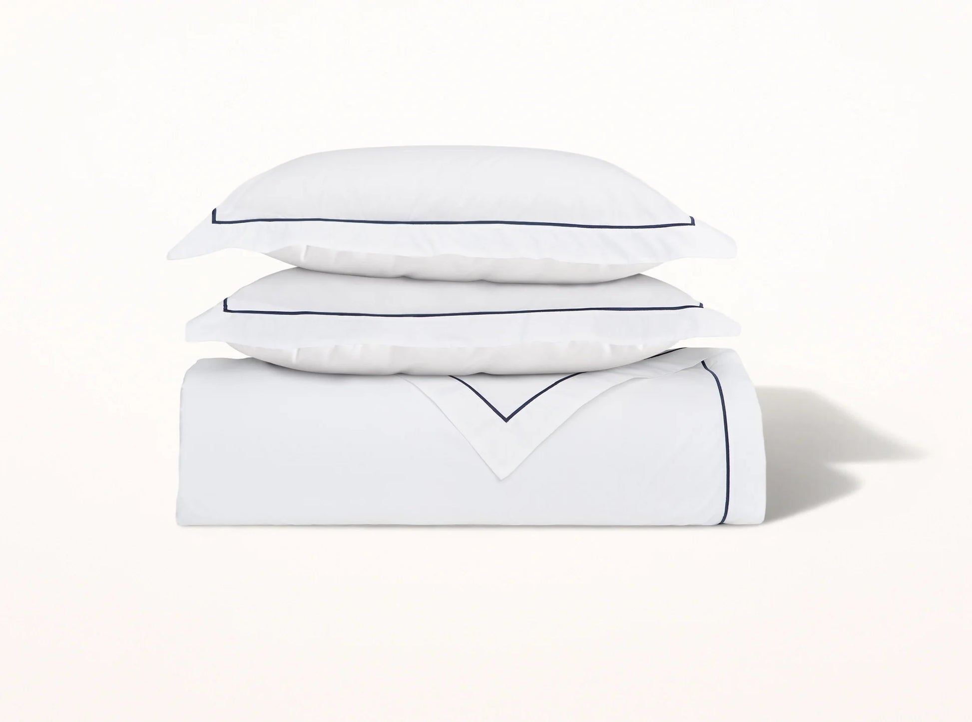 Organic cotton percale duvet cover with navy blue embroidered detail on white